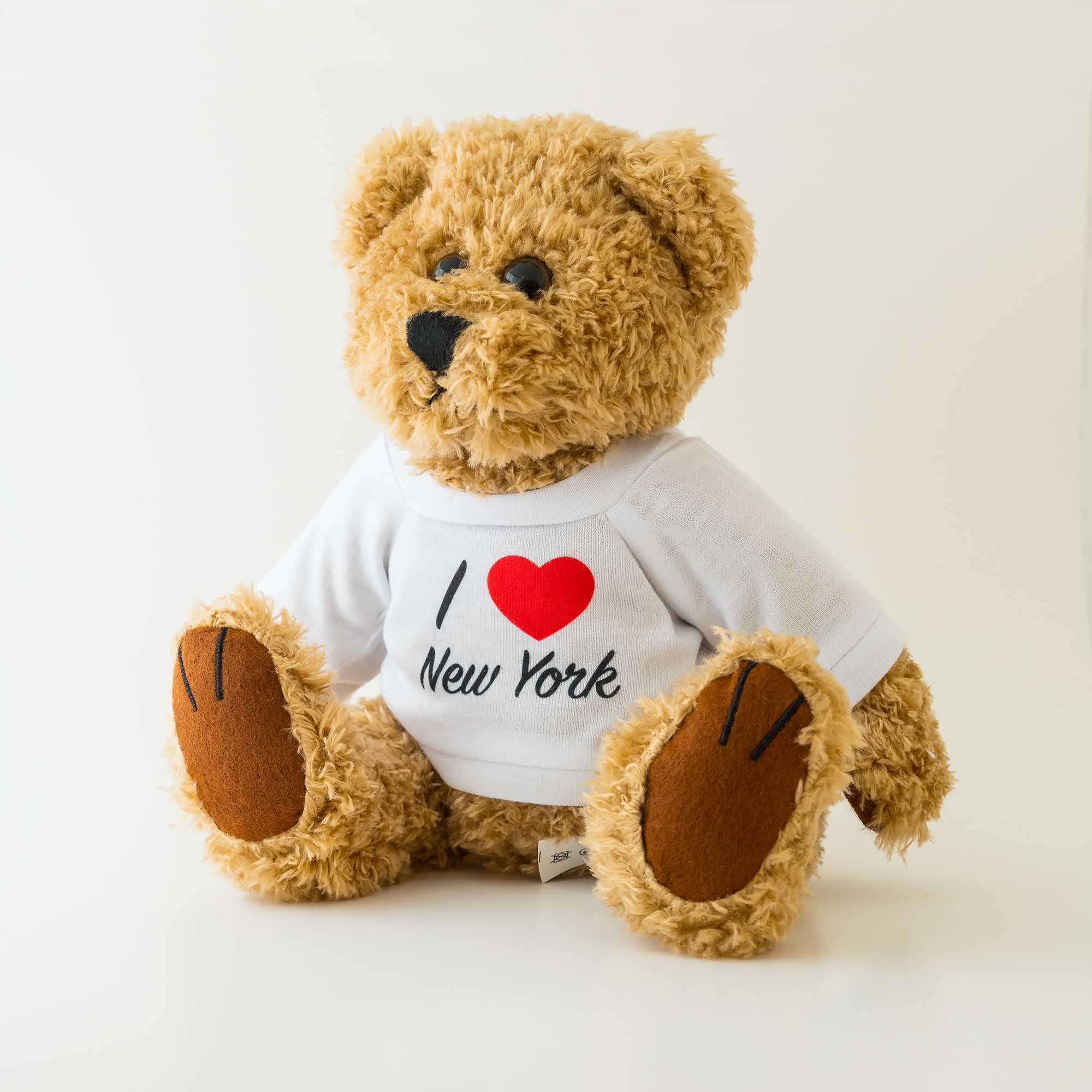 i love new york teddy bear right - Images On i love new york teddy bear, Soft brown teddy bear with printed shirt 'I Love New York' text, New York Gift product, New York souvenir