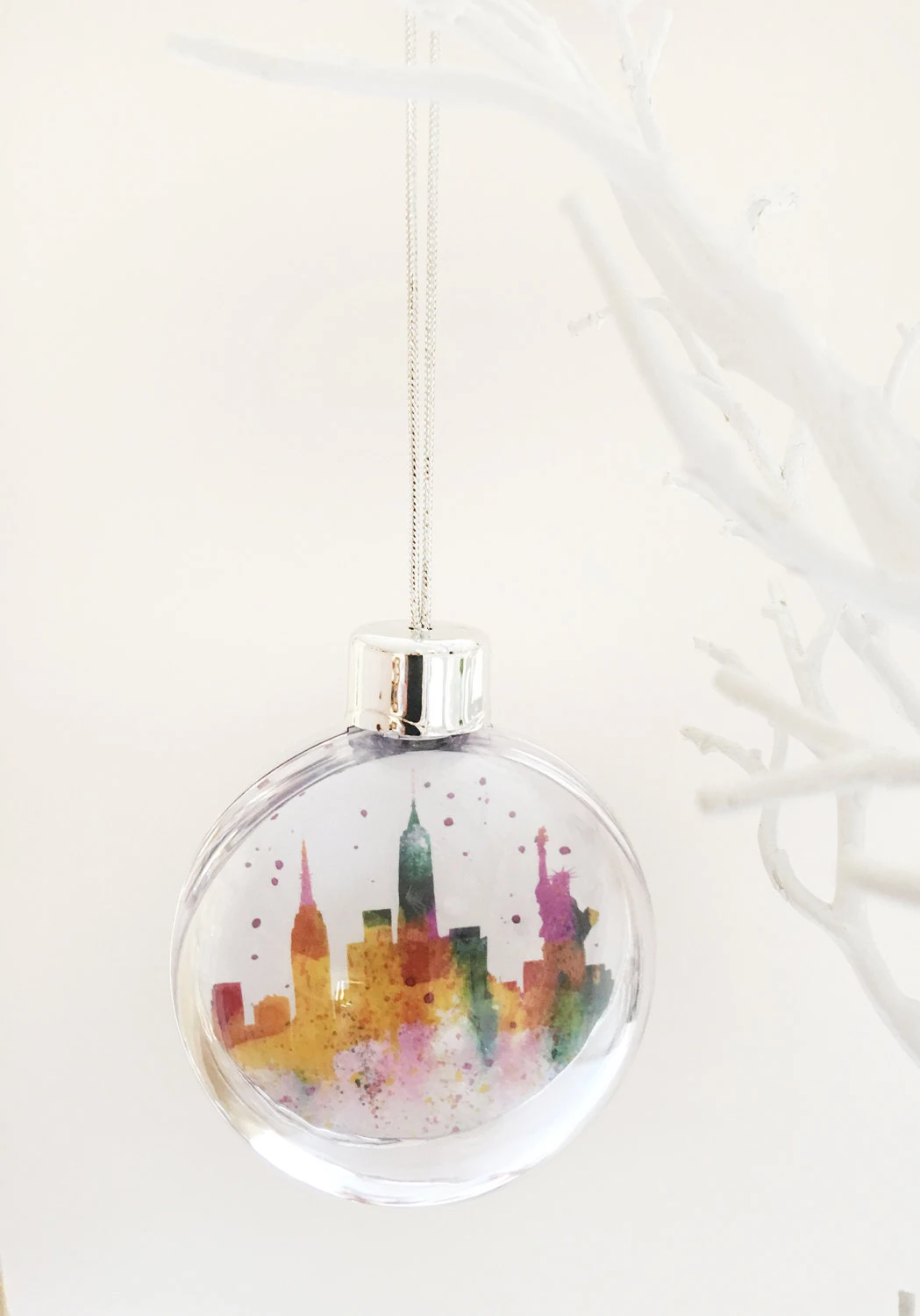 Bauble Plastic green watercolour of NY Skyline - Images On New York Christmas Bauble Plastic green watercolour of NY Skyline, New York plastic Christmas Bauble, watercolour paintings of New York, Empire State building, Statue of Liberty, New York skyline, Manhattan, New York artwork, New York painting, Louisa E. Taylor, Trump, USA