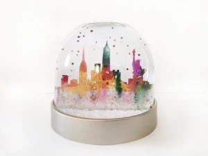 New York snow globe green splash, New York plastic snow globe, watercolour paintings of New York, Empire State B building, Statue of Liberty, New York skyline, Manhattan, New York artwork, New York painting, Louisa E. Taylor, Trump, USA